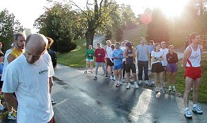 Runners letting traffic pass through before the start of the 2002 Greasy-Gooney 10K