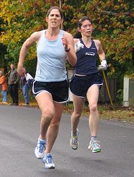 Rebecca Nathan and Audrey Ting battling for the win less than 100 yards from the finish line